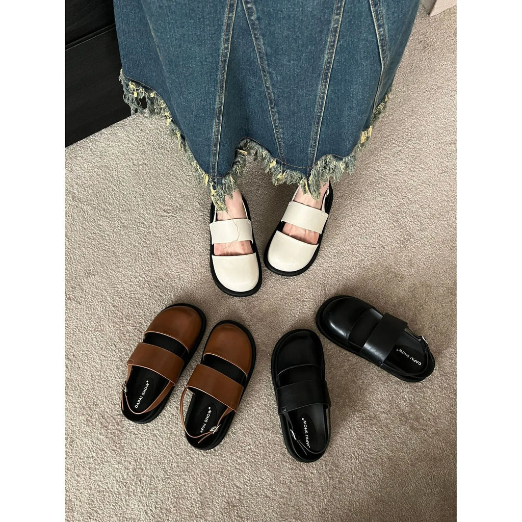 Women's retro sandals with a single ankle strap buckle and closed round toe, shown in apricot colour.