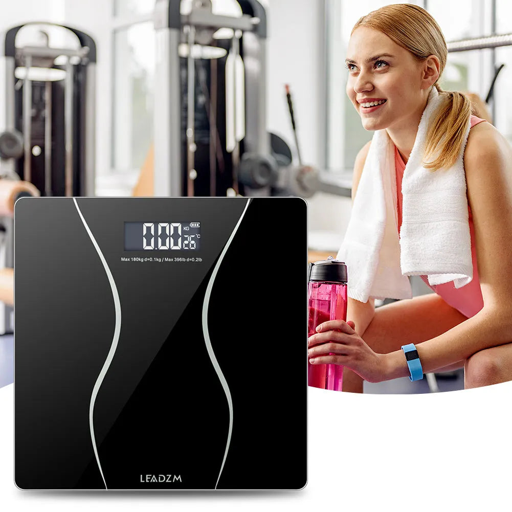 Black electronic bathroom scale with 180kg maximum capacity for household weight measurement