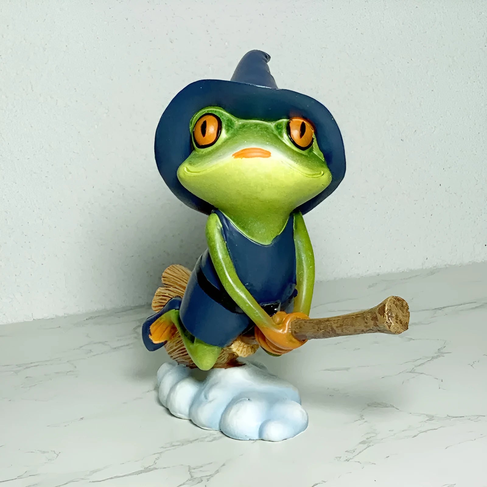 A small European-style magic yoga frog ornament in RDW123 colour, made from plastic and resin.