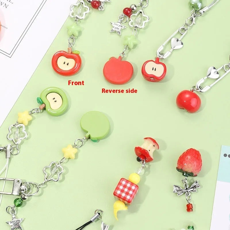 Fruit-shaped mobile phone bag pendant keychain in plastic resin with apple and strawberry design, half-handmade finish, multiple colour options