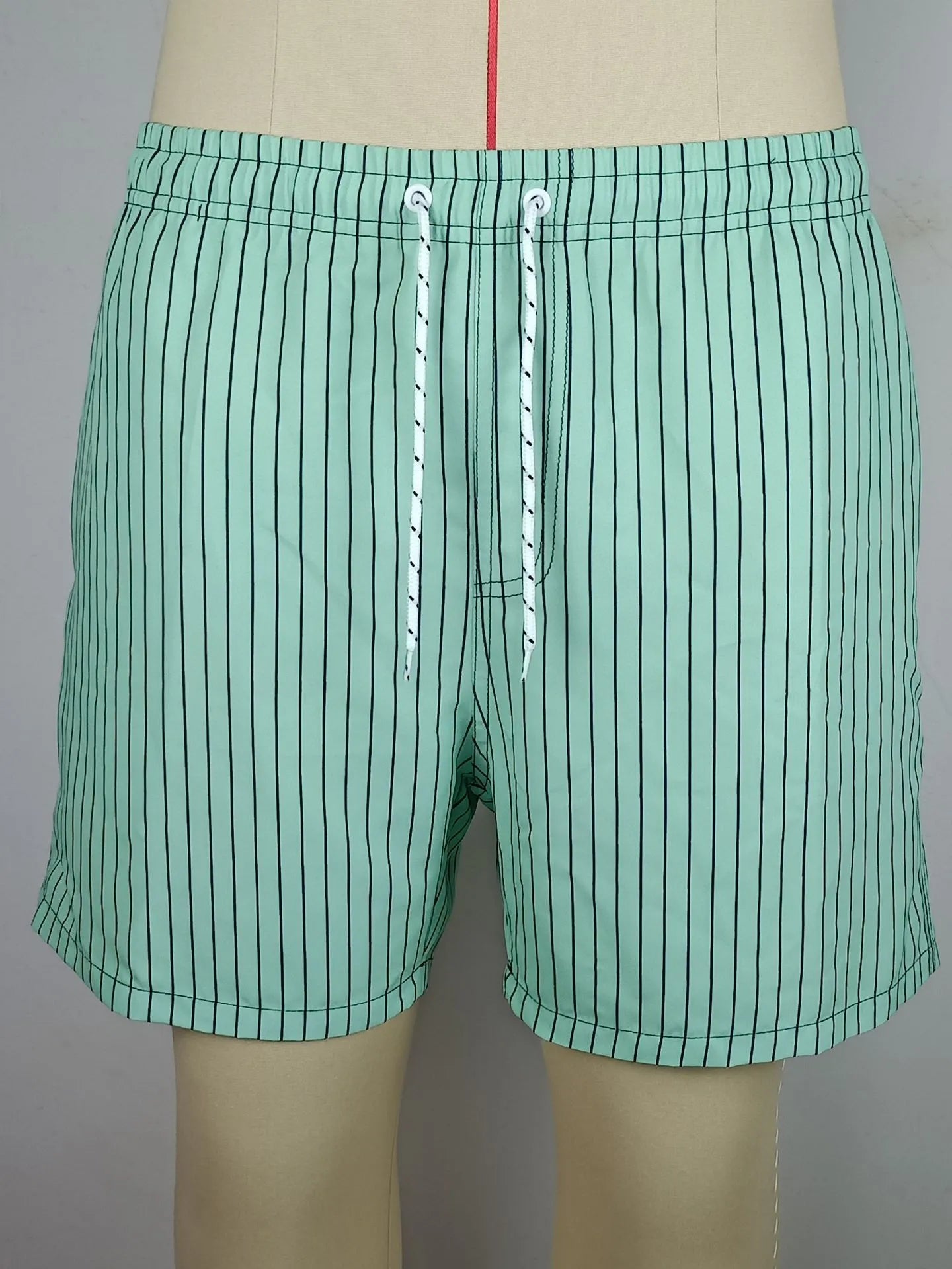 Polyester fibre beach shorts with straight leg and striped patterns in navy blue, grey, khaki or light blue