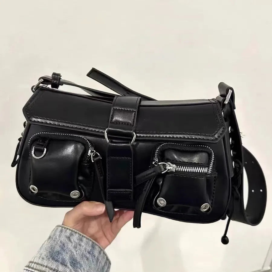 Black PU leather women's baguette messenger bag with adjustable strap and zippered internal compartment.