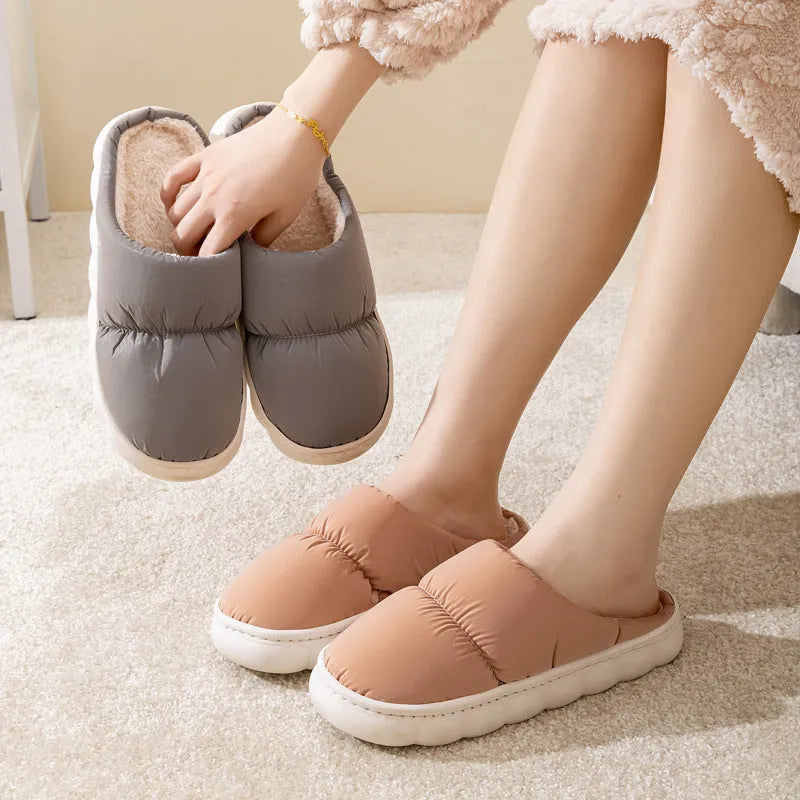 Pair of down cotton winter slippers with a thick rubber non-slip sole, shown in a choice of colours.