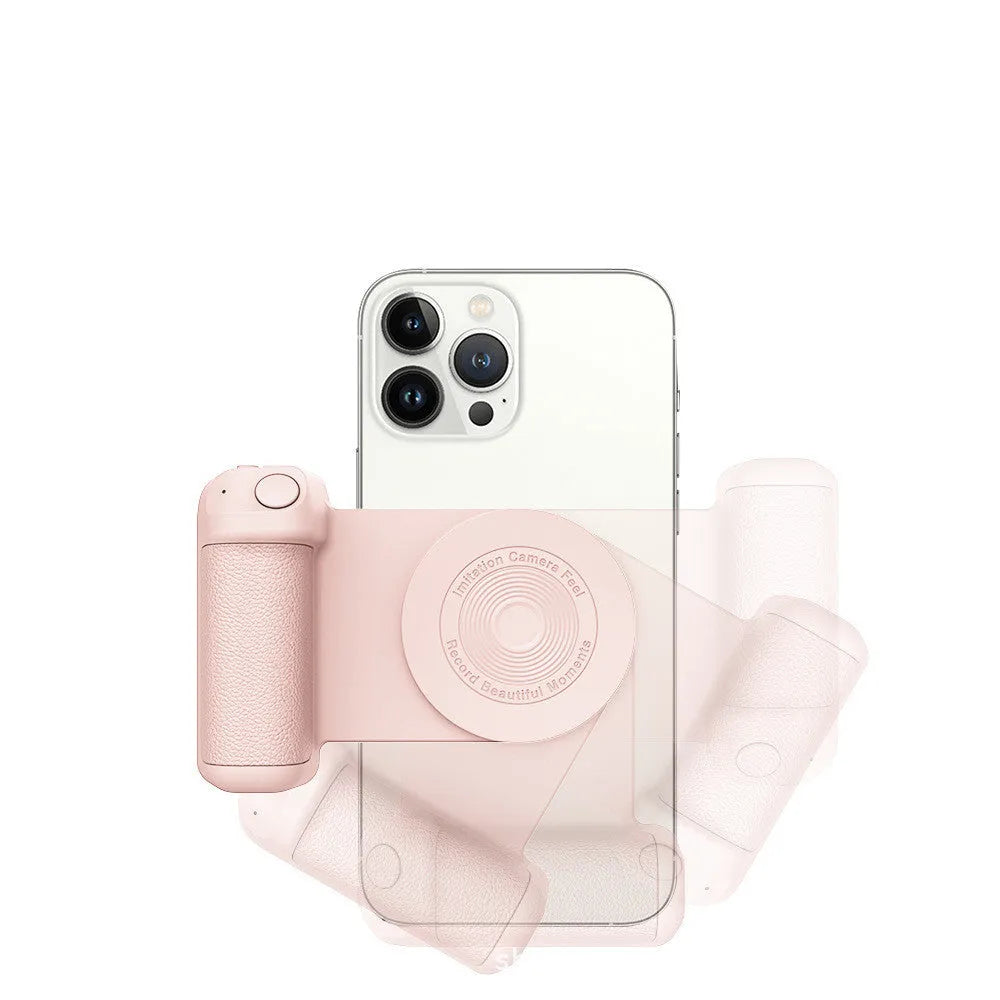 Black 3-in-1 magnetic phone camera holder with ergonomic handle on a wooden table.