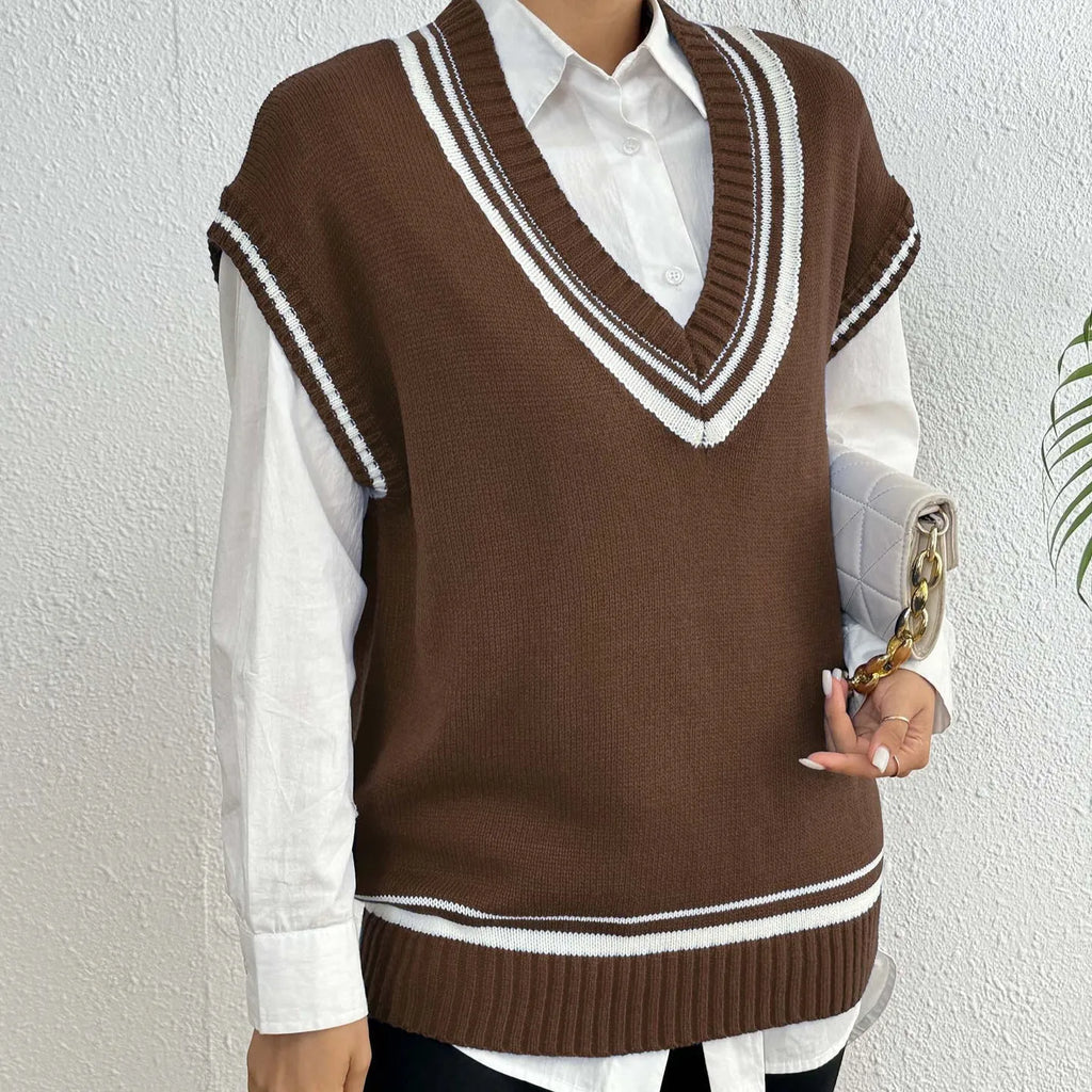 Loose-fitting women's vest sweater in a wool blend, shown in coffee, blue, and black colours.