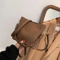 Retro brown PU leather crossbody bucket bag with a woven texture design.