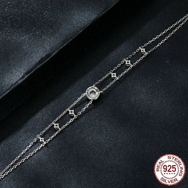 S925 silver diamond bracelet with 50 point round gemstone and electroplated finish on wrist