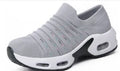 Plus size fly-knit sock shoes in black with stretch mesh upper and round toe