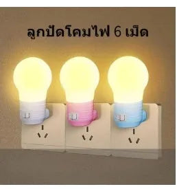 Small round plug-in bedside night light in a choice of white, blue, or pink plastic shell.