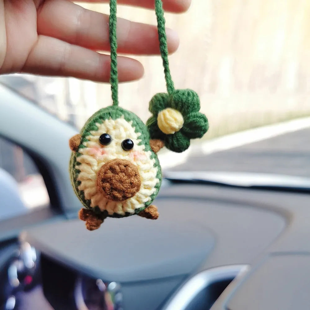 Handmade crocheted avocado rainbow flower car pendant in wool yarn for colourful vehicle interior decoration