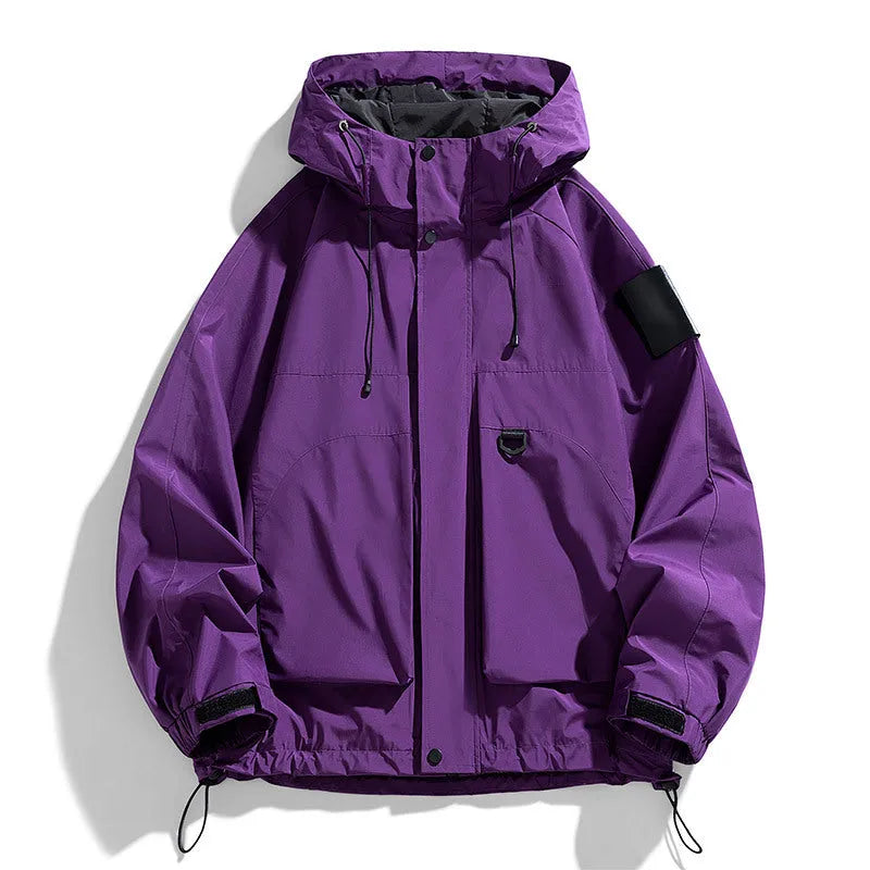 Men's black hooded waterproof windproof jacket with long sleeves, shown on a model.