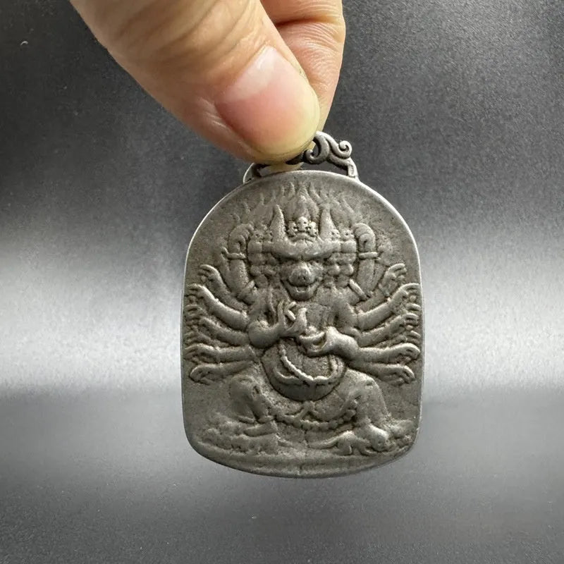 Iron metal pendant ornament with Chinese geometric style and Yamantaka deity depiction.