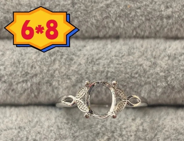 Oval open mouth copper ring with 6x8 mm star and denier pattern ornament.