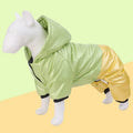 Green waterproof cotton-padded dog coat on a model dog, showing casual style and sizing.