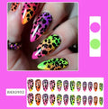 Four boxes of Wear Armour medium almond frosted nail stickers showing French leaf, plating, macaron, and leopard print designs.