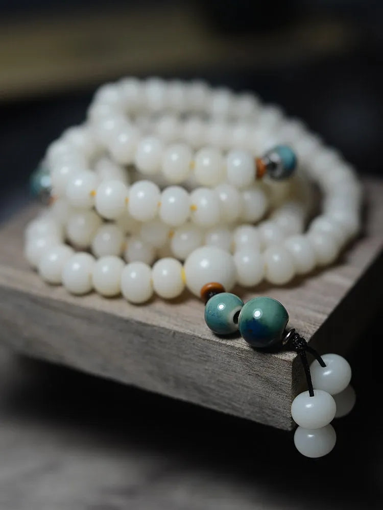 White Jade Bodhi Root Oblate Bead Bracelet with 108 natural bodhi seeds beads in 7x9mm and 8x10mm sizes