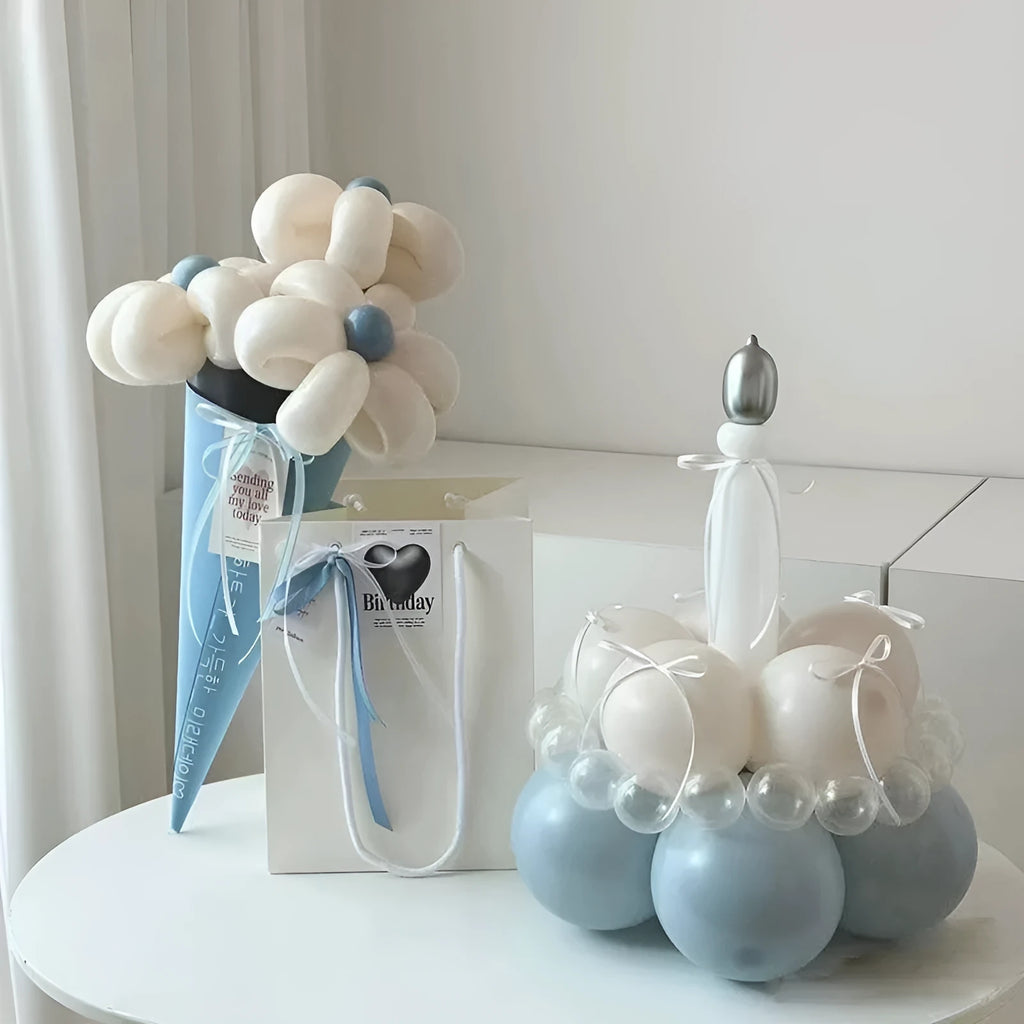 DIY finished balloon bouquet cake decoration kit with round balloons for party centrepieces.