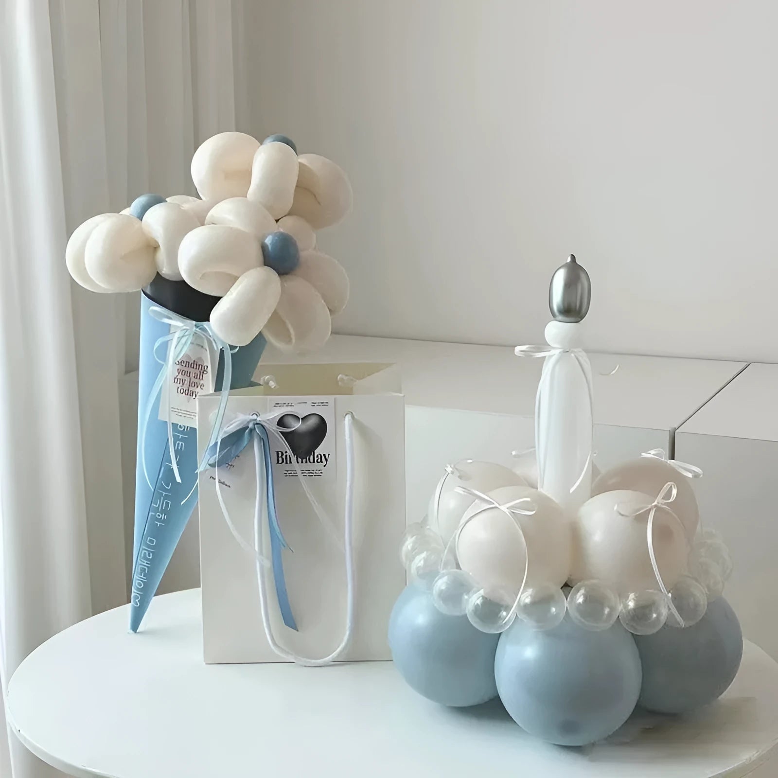 DIY finished balloon bouquet cake decoration kit with round balloons for party centrepieces.