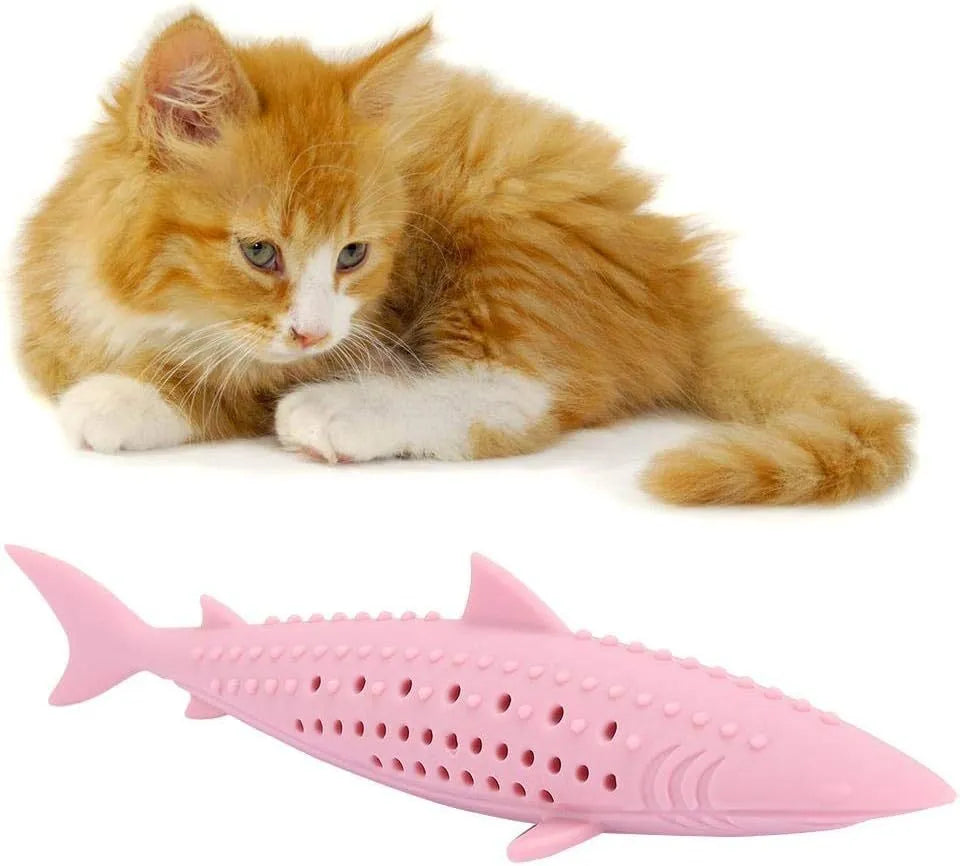 Green silicone fish-shaped chew toy for cats on a white background, showing side air holes.