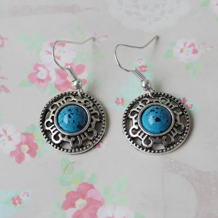 Miao silver geometric flower disk earrings with turquoise and auspicious cloud patterns