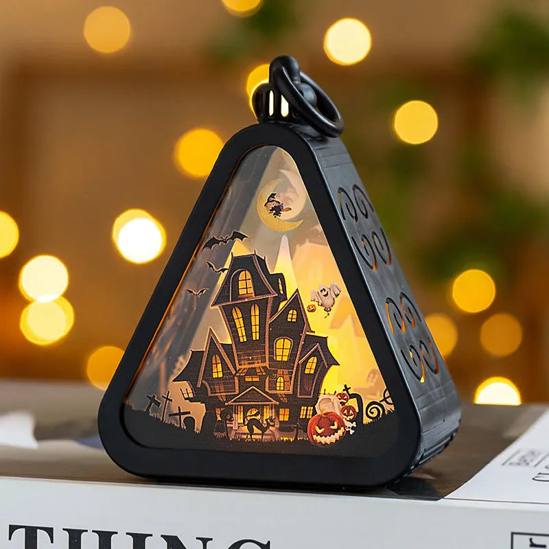 Halloween pumpkin lamp decoration in plastic and glass measuring 8.9cm by 5.2cm by 11.5cm