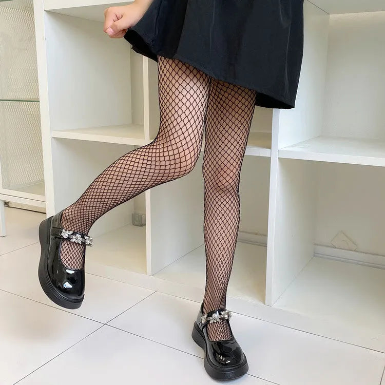Women's sheer black and white mesh stockings showing large, medium, and small net patterns