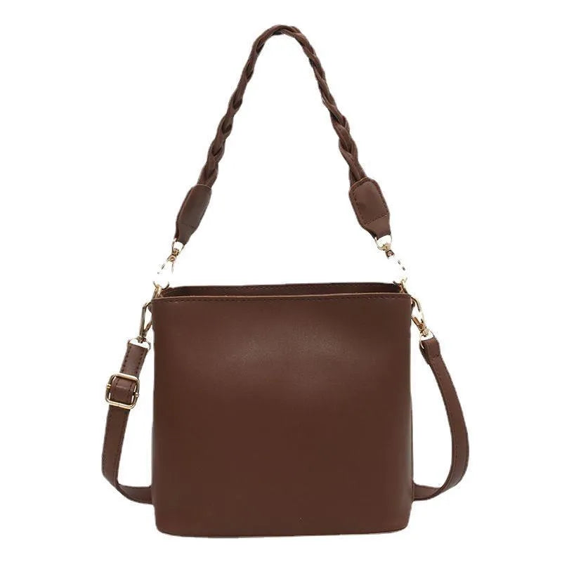 Retro brown PU leather crossbody bucket bag with a woven texture design.