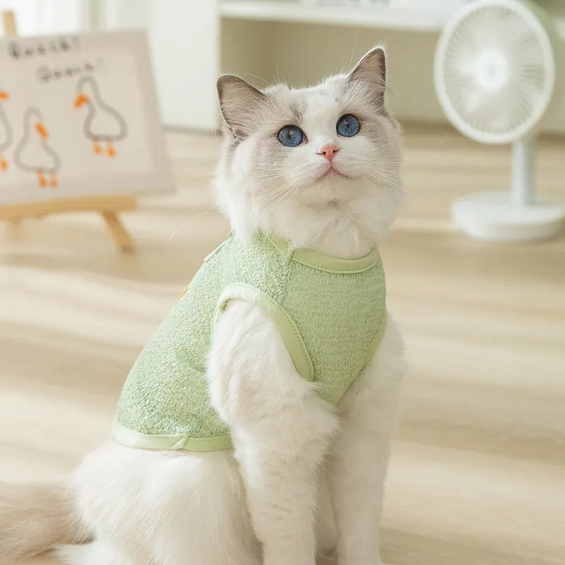 Knitted cat clothing with hollowed-out breathable design and cartoon bear patch in green colour