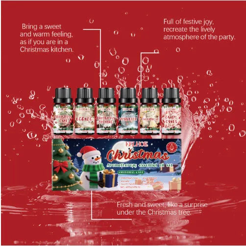 Christmas aromatherapy oil set showing six bottles in three festive scents with different sizes