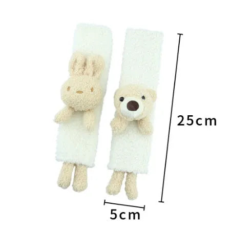 Soft plush car seatbelt shoulder protector with cartoon bear and rabbit designs made from lamb wool.