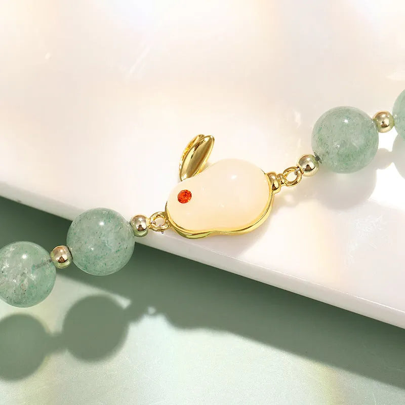 Women's casual rabbit bracelet with green aventurine natural stone beads and copper plated metal with 14k gold accents