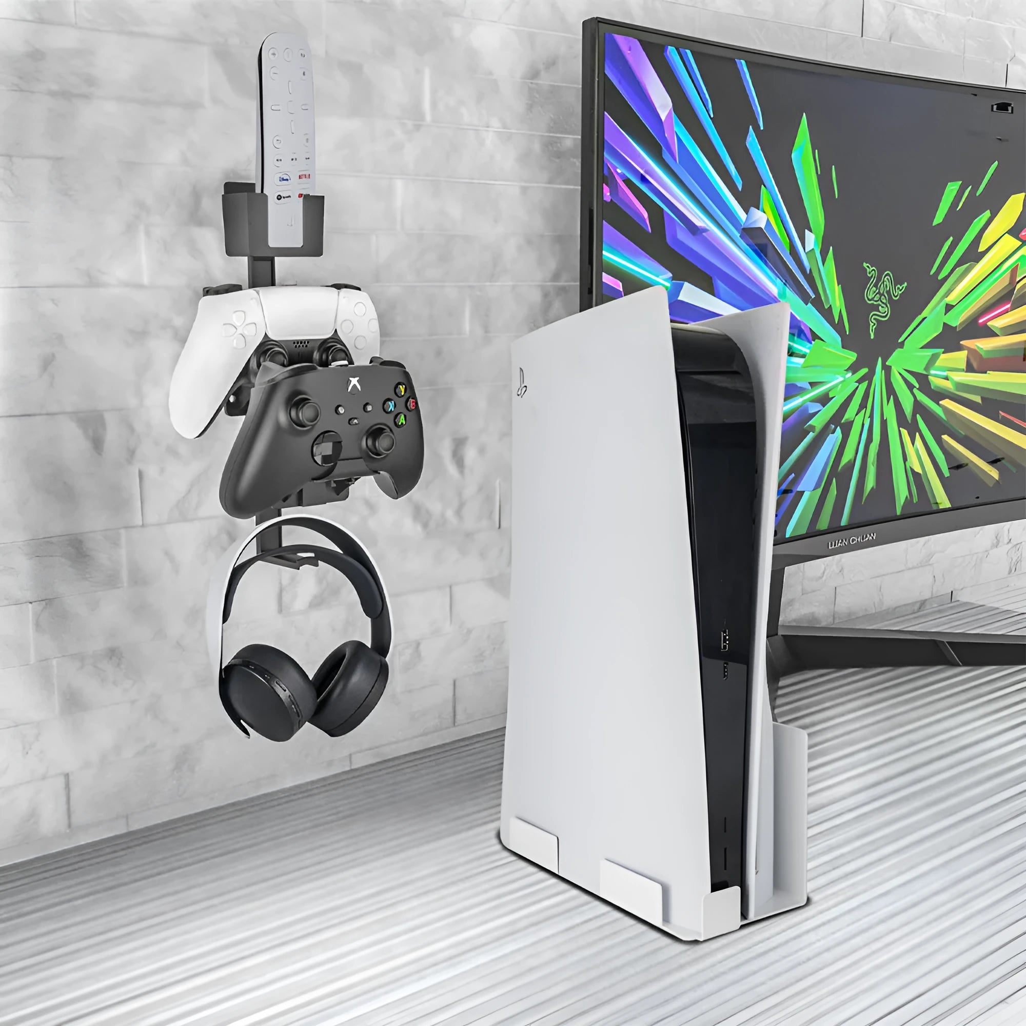 White wall-mounted hook holding PS5 controller with black gaming headset hanging beside it