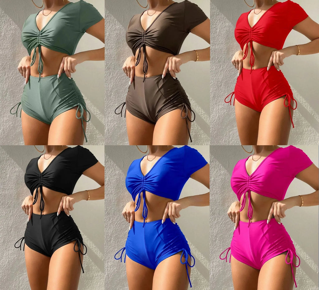 Dark green ladies lace-up bow swimsuit top with matching shorts on a mannequin