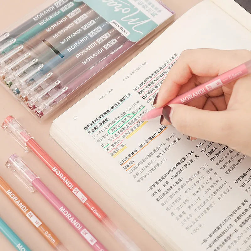 Set of nine colourful retro gel pens with 0.5mm needle tips in a plastic storage case