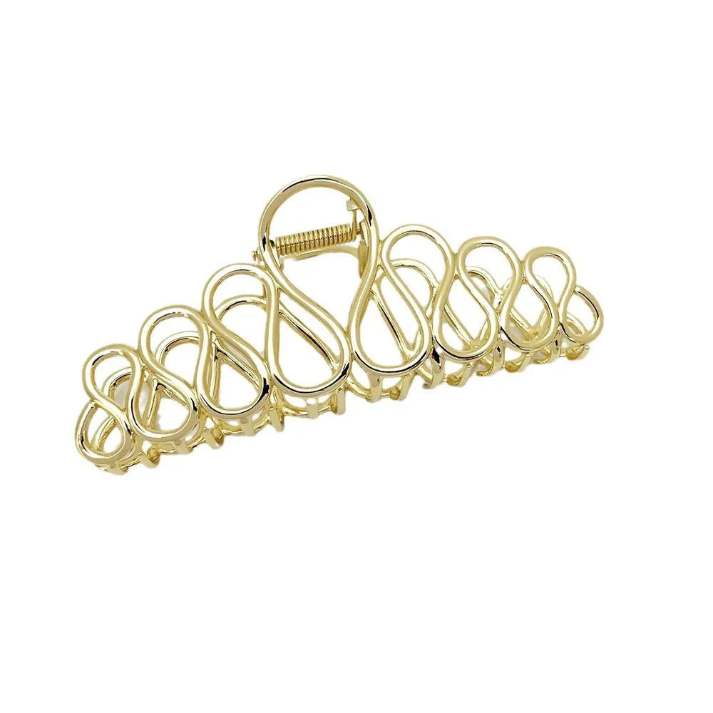 Updo minimalist large hair clip in gold, alloy with electroplated finish and tassel detail