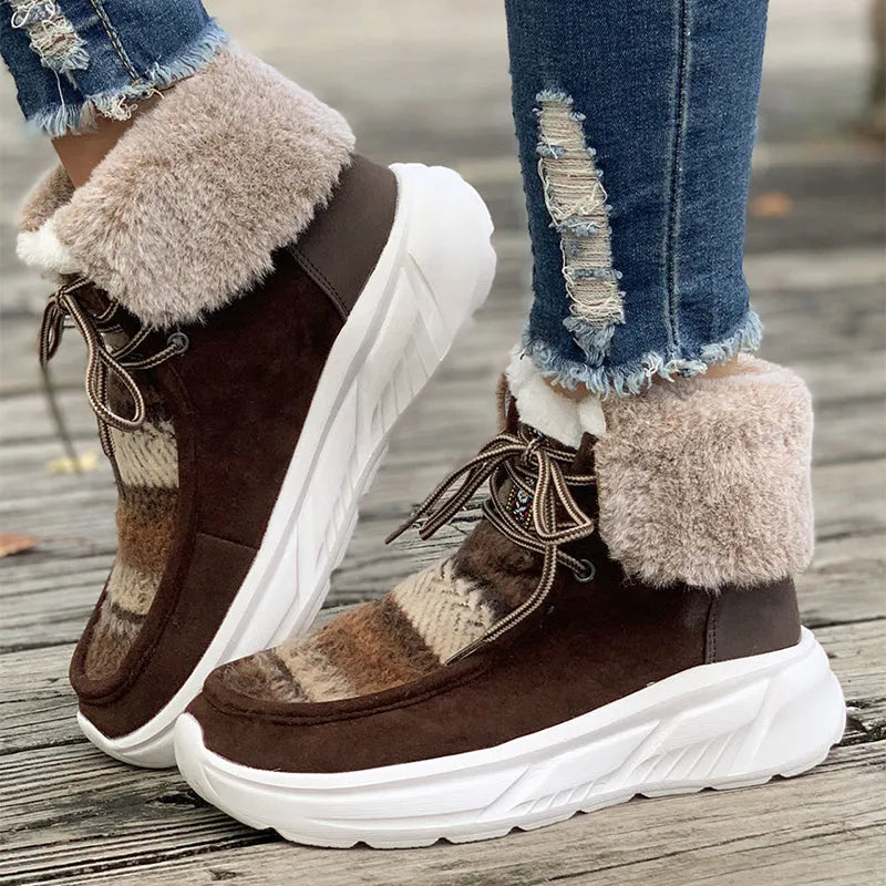 Beige women's lace-up suede snow boots with thermal lining and a thick rubber sole.