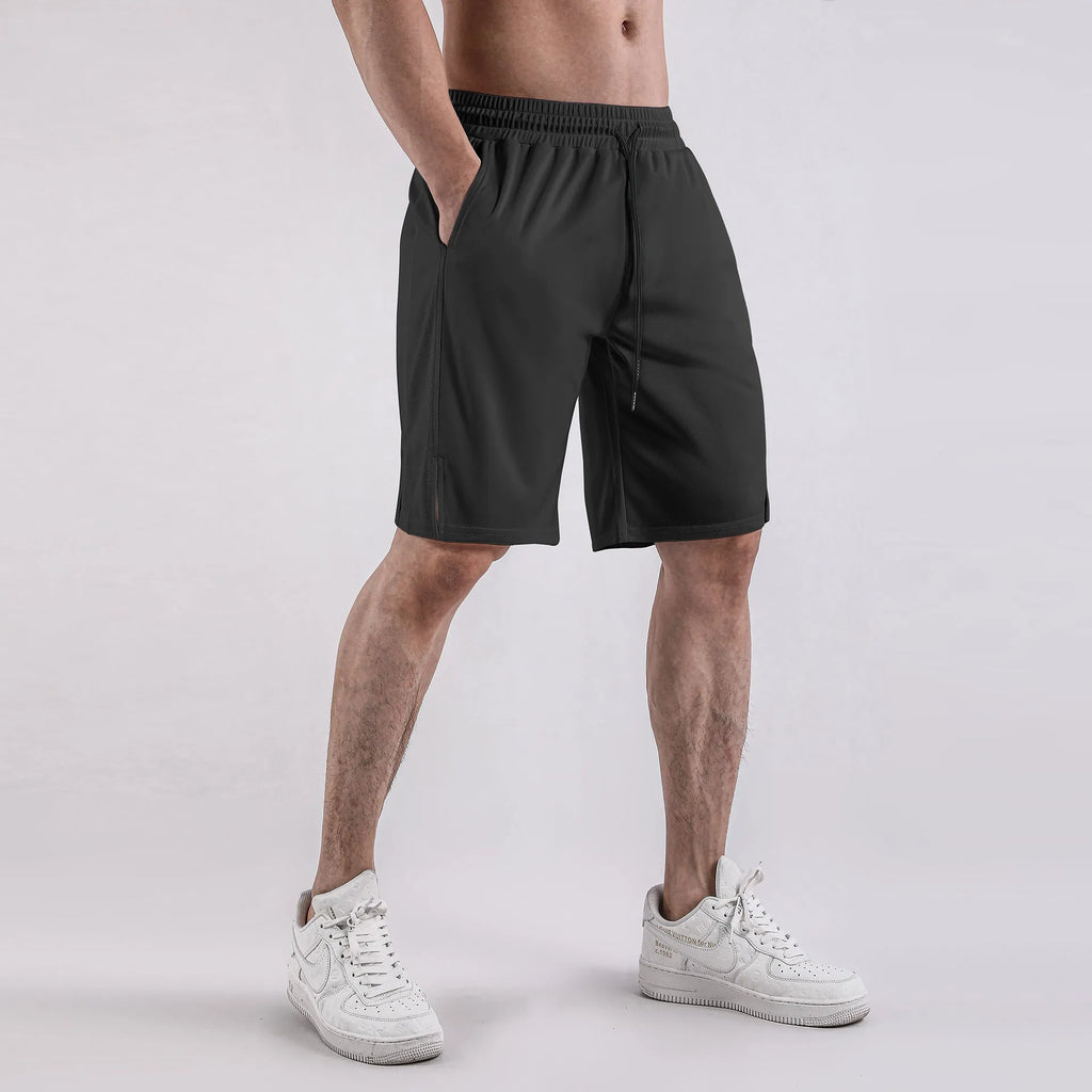Men's quick-drying mesh shorts in black and white with elastic waist and loose fit