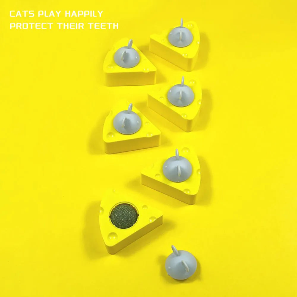 Yellow edible catnip and silvervine toy balls for indoor cat teeth cleaning and play