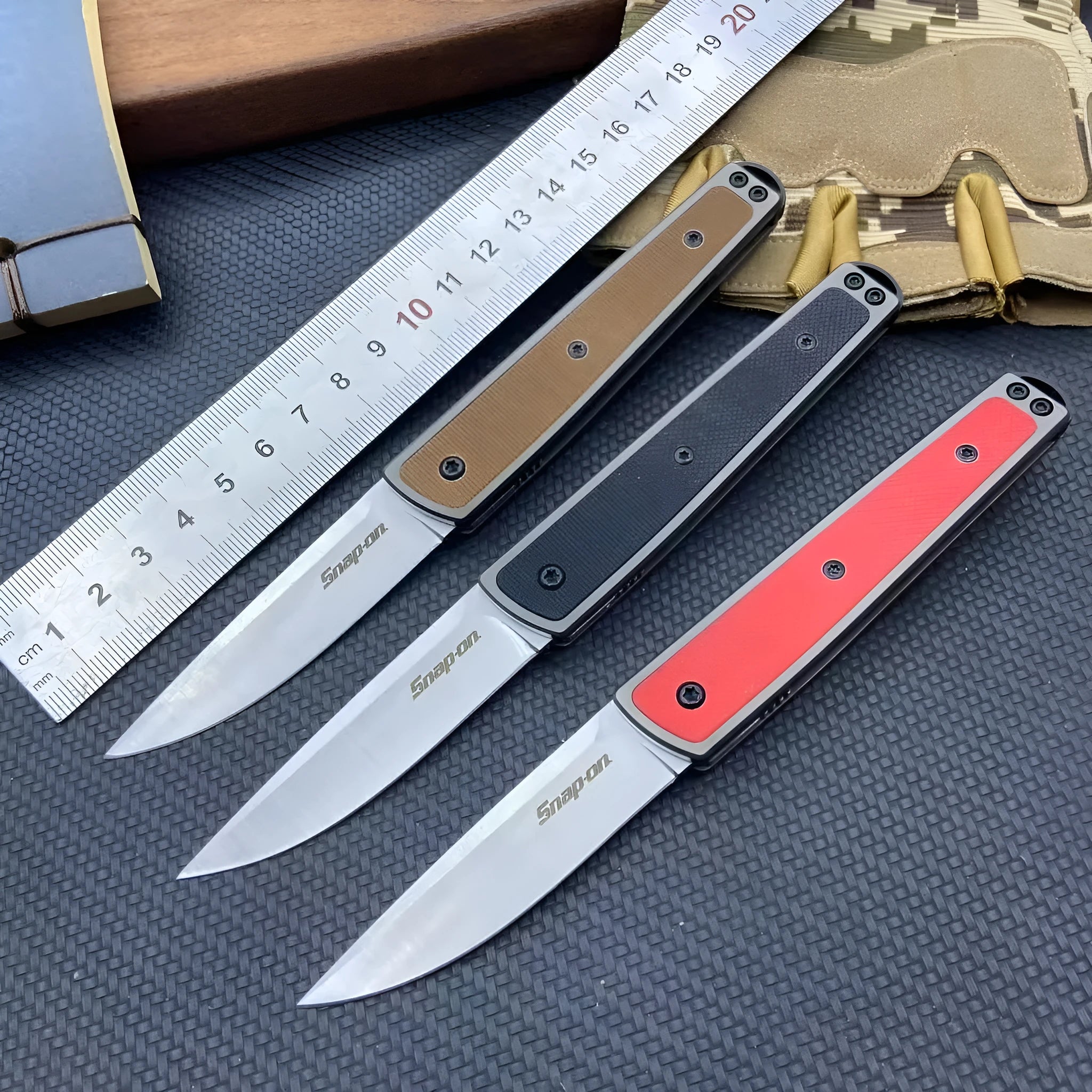 CRKT 7190 folding fruit knife showing blade and handle in choice of black, coffee brown, or red colours