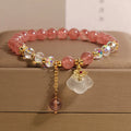 Women's natural strawberry quartz white agate crystal bracelet with auspicious cloud carvings on stretch cord