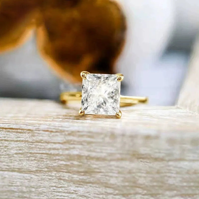 Women's simple geometric sterling silver ring with round zirconium stone in silver, gold, or rose gold colour.