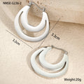Geometric French earrings with 18K gold plating on stainless steel, featuring round ring elements in minimalist design