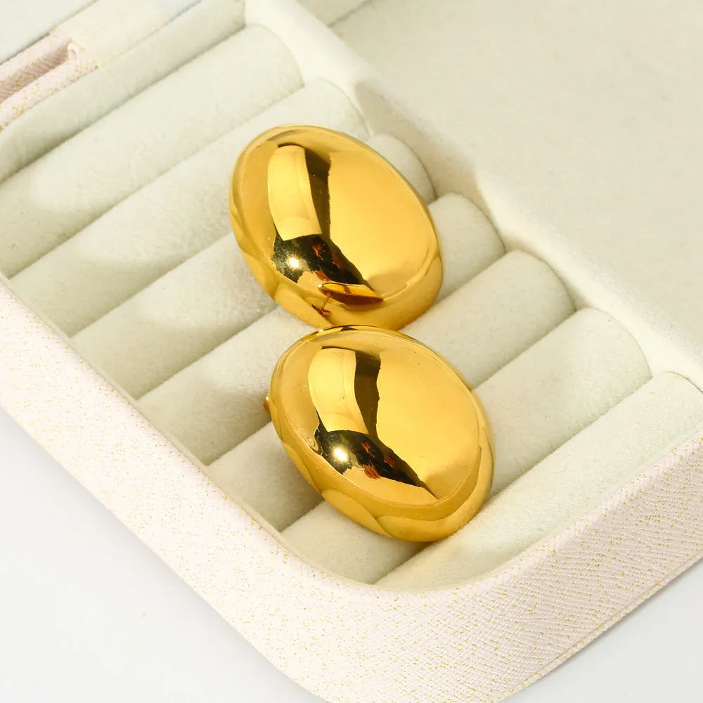 Geometric ear studs with exaggerated glazed surface in 18K gold electroplated stainless steel