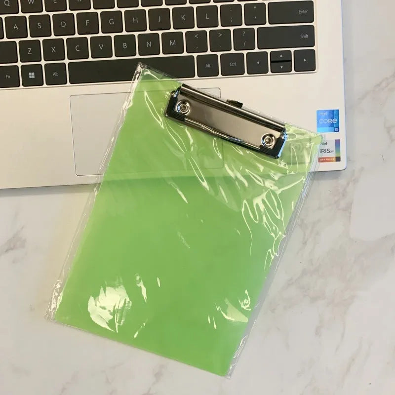 Transparent A4 writing board with metal clip holding papers, available in multiple colours