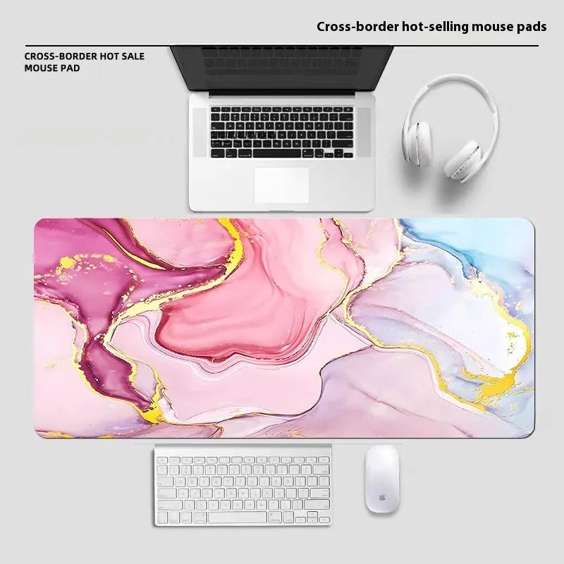 Large diatom ooze mouse pad with printed pattern, non-slip rubber sole, and polyester surface for desk use