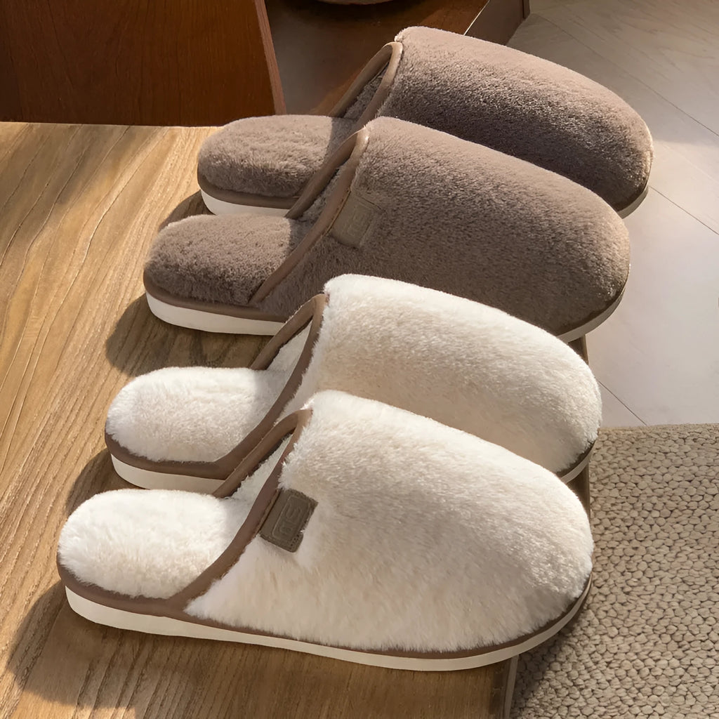 Unisex solid colour plush slippers with non-slip PVC soles and car stitching detail