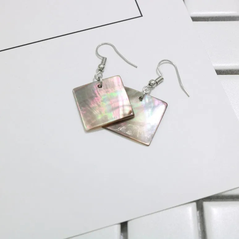 Women's geometric drop earrings made from real shell in square panther colour.