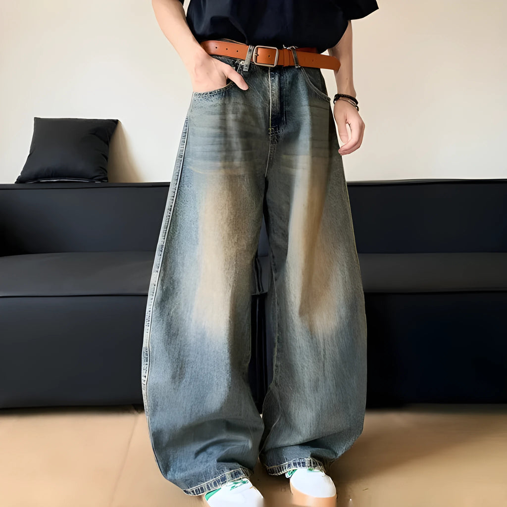 Men's retro blue distressed denim wide-leg pants with vintage styling and slimming silhouette