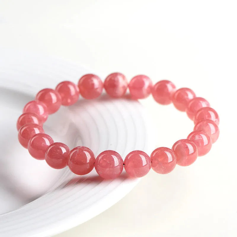 Women's red crystal bracelet with geometric stone beads and longevity lock fastening