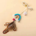 Cat toy with feather rope hanging from door using elastic and sticky buckle clamp, available in Blue, Green, and Pink
